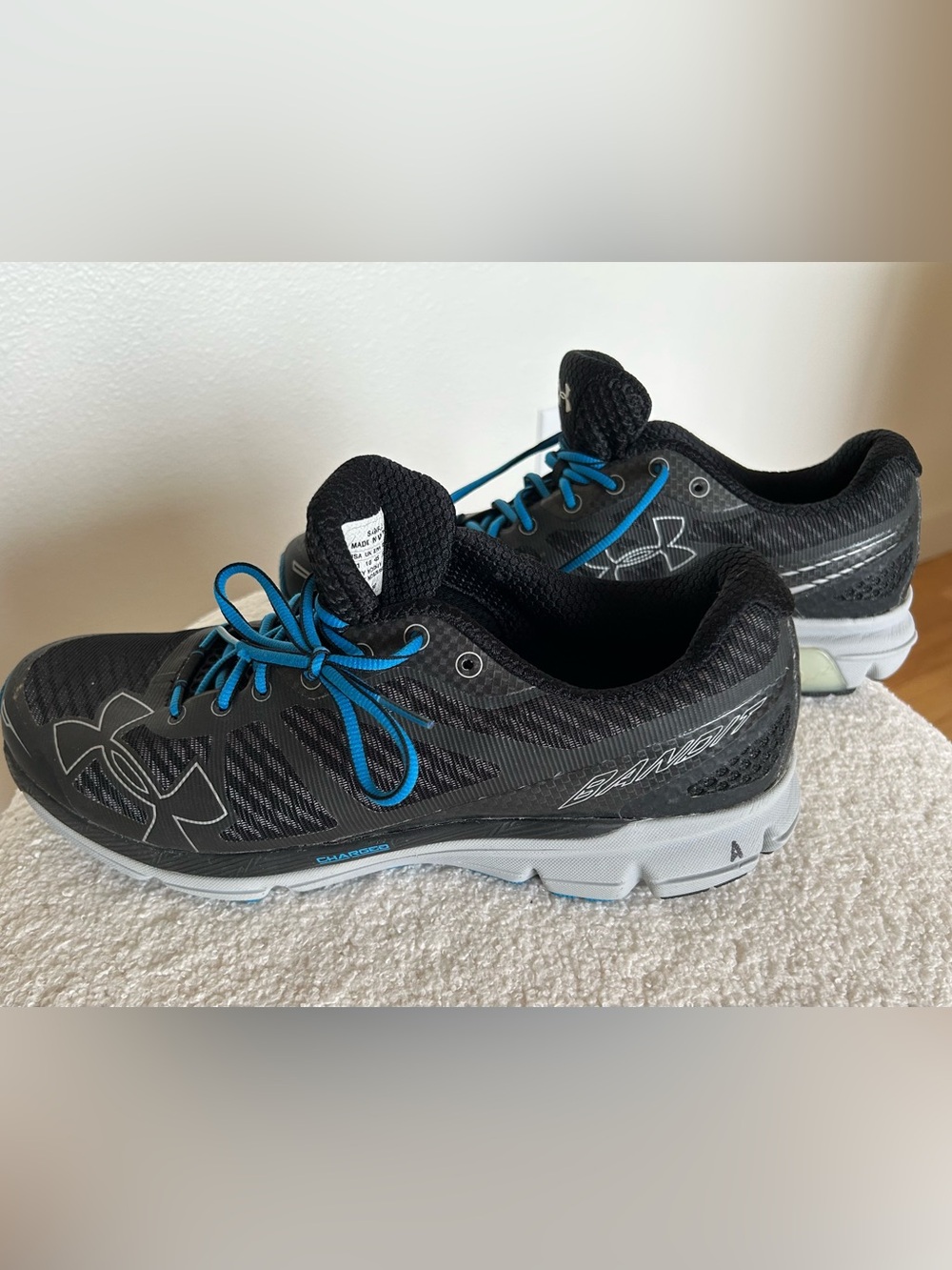 Under Armour Men’s Black Athletic Shoes with Blue Laces